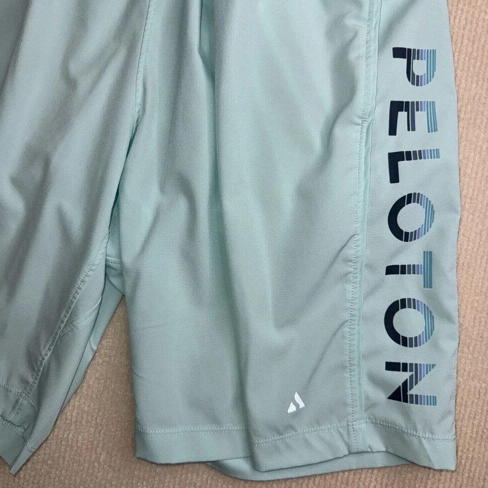Solfire Peloton Athletic Shorts Men Small Light Blue Reflective‎ Graphic Active